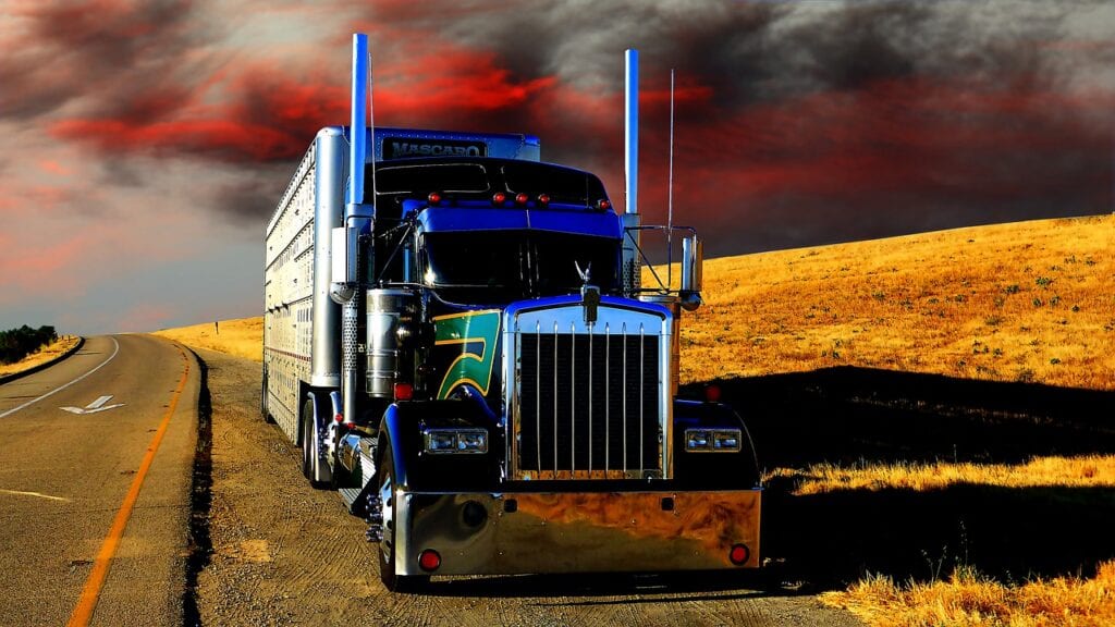 transport-truck-sunset-with-grass