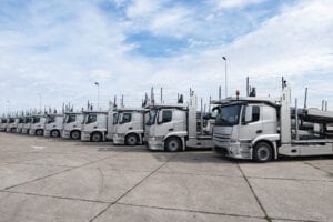 group-of-trucks-parked-in-line-at-truck-stop