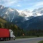 What are the best methods for transporting a car from the USA to Canada?