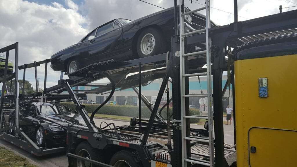 What is the best way to transport an antique car?